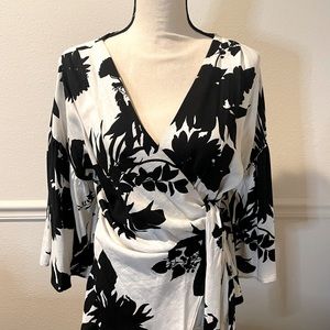 Black and white patterned wrap blouse by ZARA. Made in Morocco.